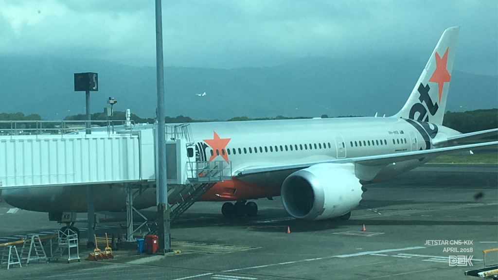 A Jetstar 787-8 Dreamliner parked at Cairns Airport.
