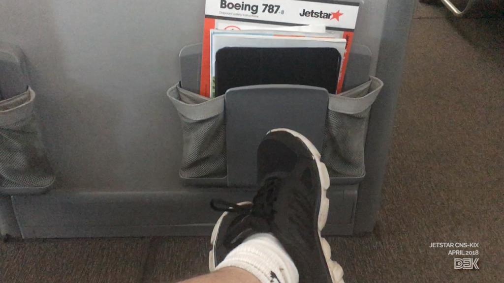 The legroom is slightly better behind the toilets or galley (row 44 here) but you can't have bags at your feet.