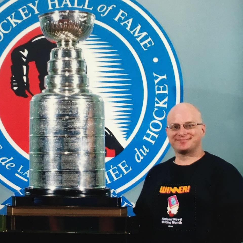 Derek with the Stanley Cup at the Hockey Hall of Fame in Toronto.