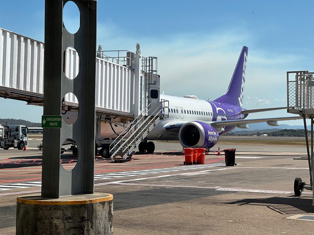 Bonza's Boeing 737 MAX 8, named "Shazza", awaits passengers at Townsville airport.